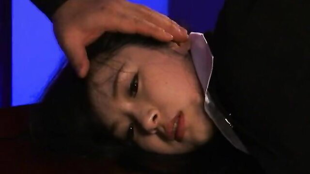 Hina Maeda in JAV closeup, hand on head, sultry expression