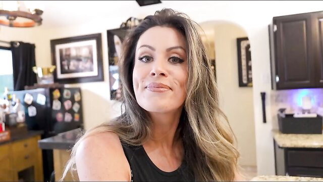 Coco Vandi smirking in kitchen, hot stepmom undress poker preview