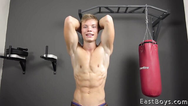 Leo Jonasson flexing ripped abs and biceps in EastBoys audition