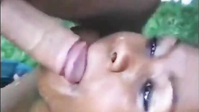 Closeup black man facefucking Asian woman deepthroat blowjob