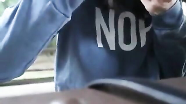 Asian girl in hoodie caught masturbating shares her weed closeup