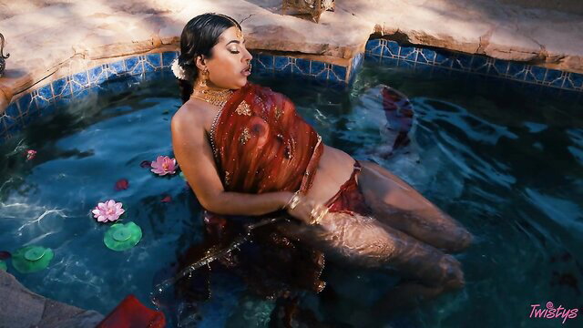Jasmine Sherni in wet red saree, sensual pool pose - Twistys