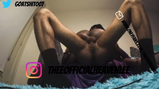 Heavan Lee black stud spreads ass wide in bondage mask tease