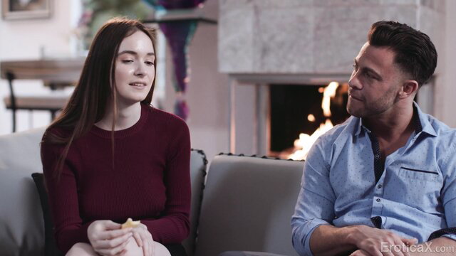 Hazel Moore smiles at Seth Gamble on intimate first swinger date couch