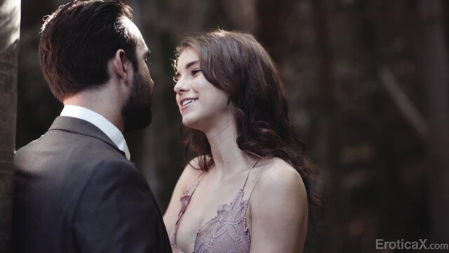 Ellie Eilish smiles at Logan Pierce in lacy dress forest tease