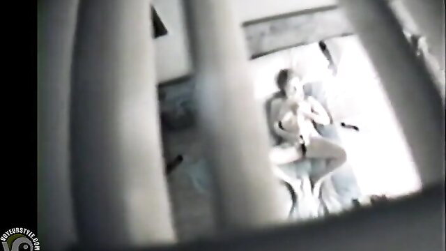 Voyeur cam spies on pale skinny babe masturbating nude on chair