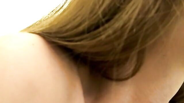 Blonde big titty woman nude shoulder and hair closeup webcam tease