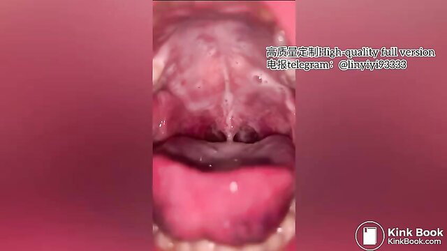 Closeup of girl opening mouth wide, pink tongue out, ready to spit or vomit