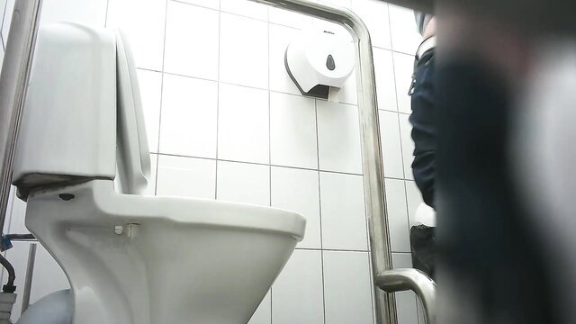 Amateur public toilet spy cam of woman peeing POV closeup