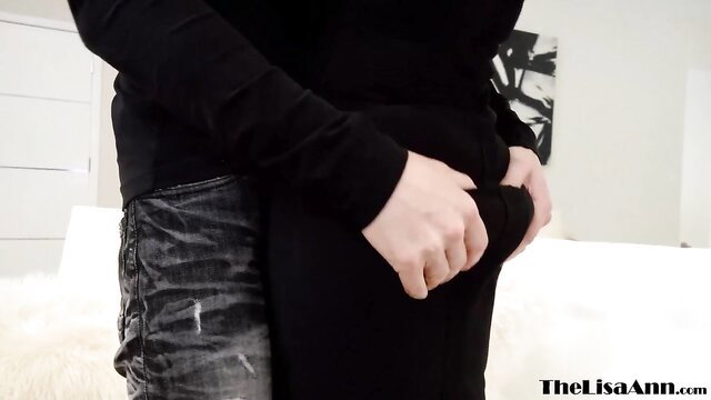 Lisa Ann groped in tight black pants by man in jeans