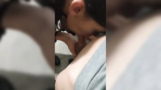 Blurry closeup of woman sucking cock, neck bulging from deepthroat action