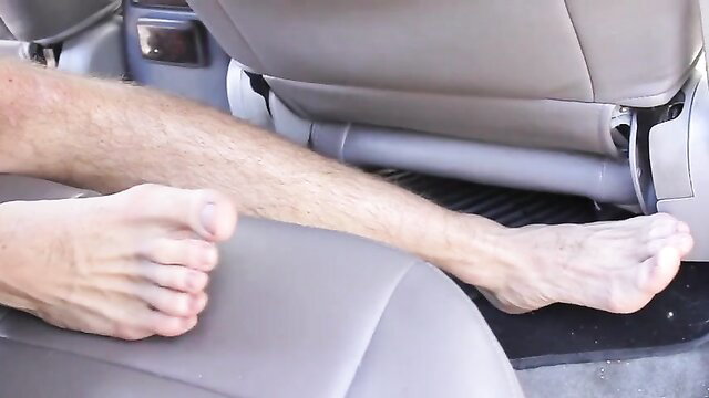 Xander's Luca chilling barefoot in car, sexy male feet up close