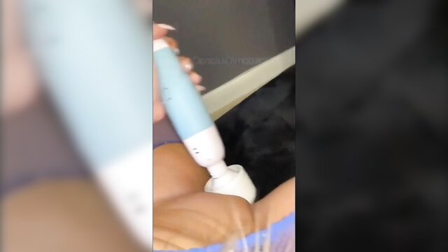 Black woman using blue vibrator on pussy in interracial threesome tease