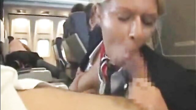 Blonde stewardess gives handjob to passenger on airplane