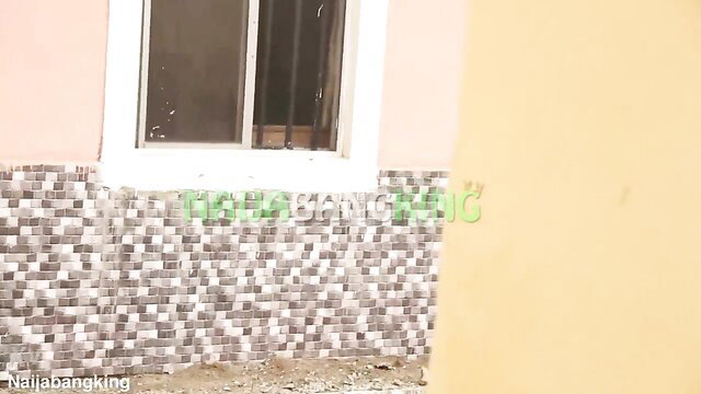 Nigerian MILF in pink hotel room by window with tiles