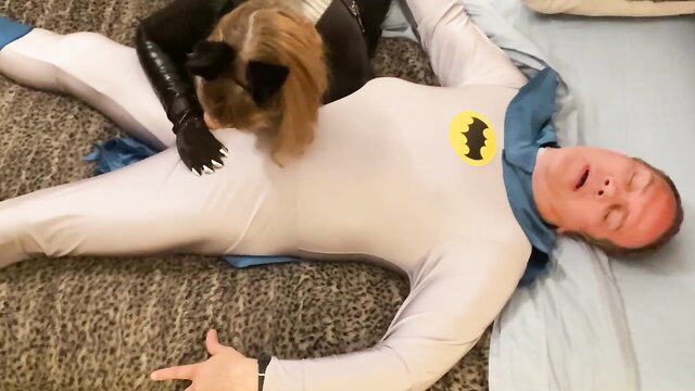 Granny Catwoman deepthroats Batman's cock in wild cosplay blowjob