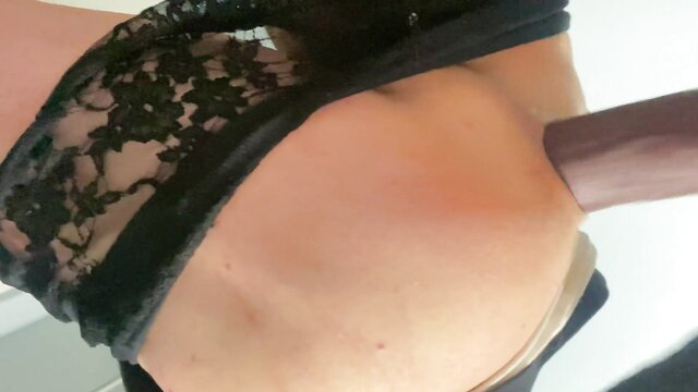 Feminine man in black lace lingerie with huge black cock from behind