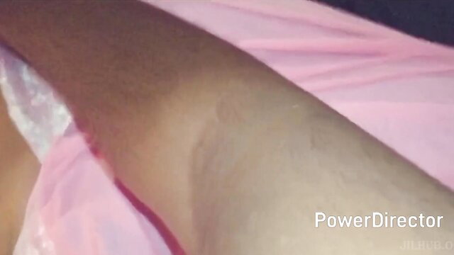 Sri Lankan couple leak: closeup brown arm on pink sheets