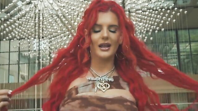 Justina Valentine redhead singer in sexy dress showing cleavage hot celeb