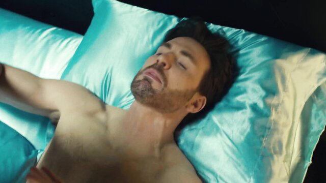 Layne Lazor shirtless sleeping on satin sheets in Honey Don't
