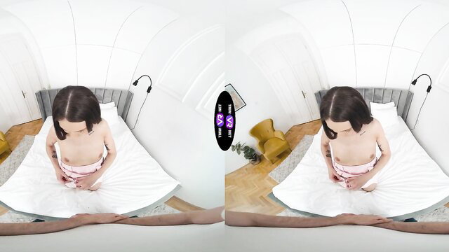 Matty Mila nude on bed in pink diaper, kneeling pose