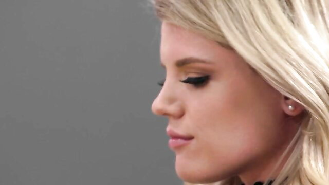 Blonde beauty with perfect profile in sexy office tease