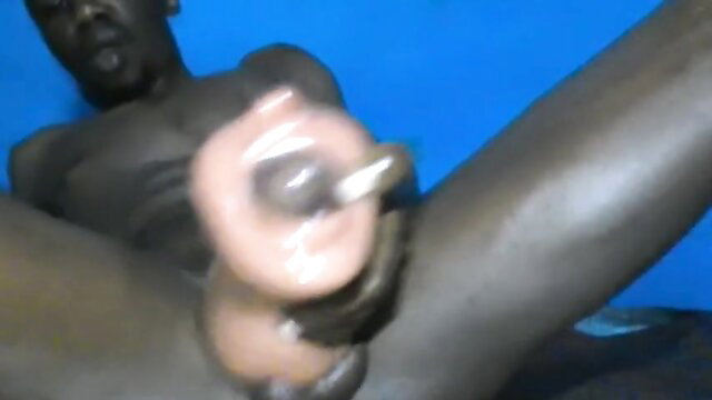 Black man groaning as he fucks fleshlight sex toy hard to orgasm