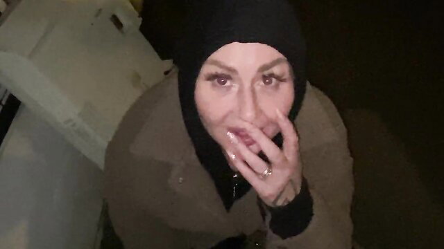 Arab MILF in niqab and trenchcoat teases lips closeup, cumshot ready