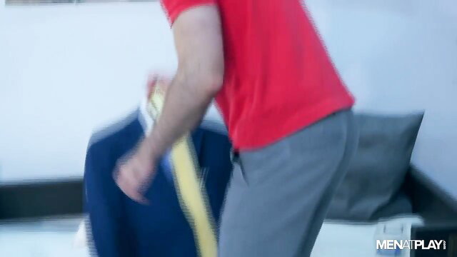 Hot guy in red shirt grabs suit over furry torso, irresistible body tease