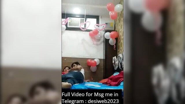 Hot Indian couple fucking passionately on bed with balloons