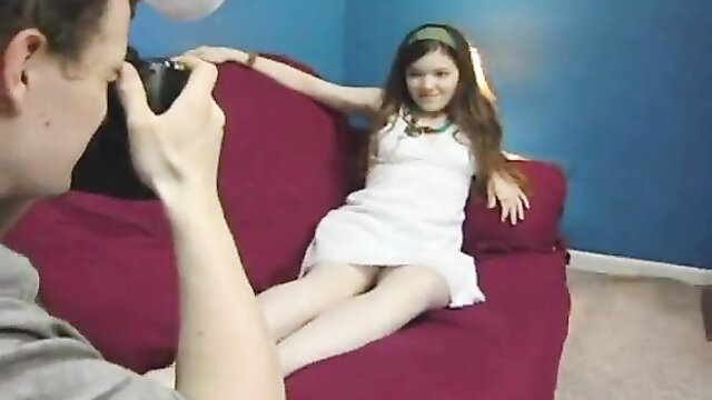 Young teen girl in white dress posed for brother photo shoot