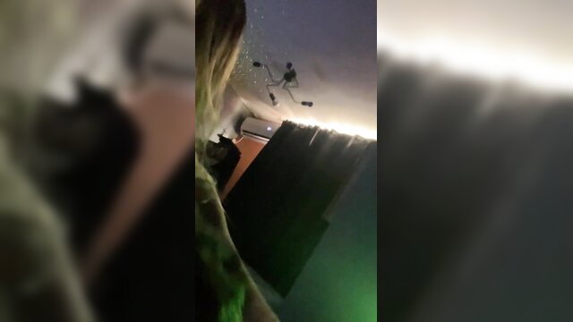 Blurry POV of woman gulping smoke from man's mouth in lesbian smoke fetish scene