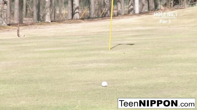 Adorable Chinese teenie on golf course, par 3 tee, ready for strip golf fun