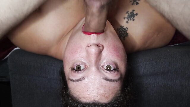 SBBW with skull tattoos deepthroats huge cock upside down