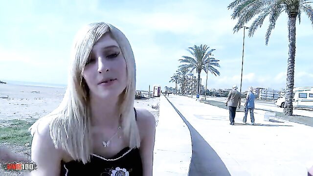 Blonde British pornstar Jessica Jensen on sunny beach promenade