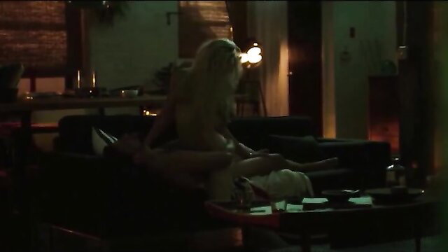 Blonde babe straddling cowgirl on couch in hot nude sex scene