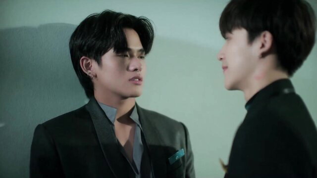 Two handsome Asian guys in suits, intense close-up BL gaze from Deep Night