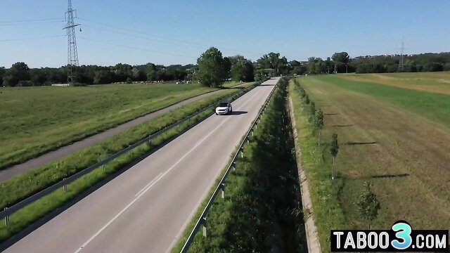 Angelika Grays blonde in car on rural road, outdoor adult scene