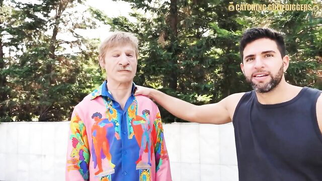 Antonio Mallorca with hot Brazilian MILF in colorful shirt outdoors