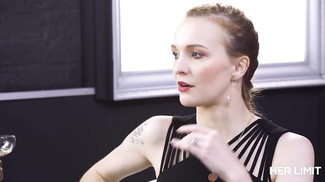 Belle Claire redhead in sexy black dress interview style