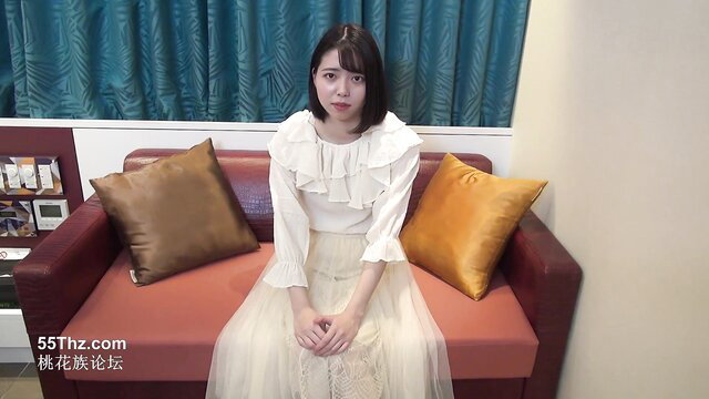 Asian amateur JAV girl in frilly white blouse and tulle skirt on couch
