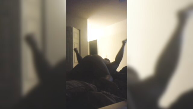 Amateur woman legs up on bed, big ass exposed, ready for dick