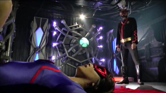 TGGP 82 Kiyoka Hirata in purple catsuit restrained by villain in sci-fi JAV scene