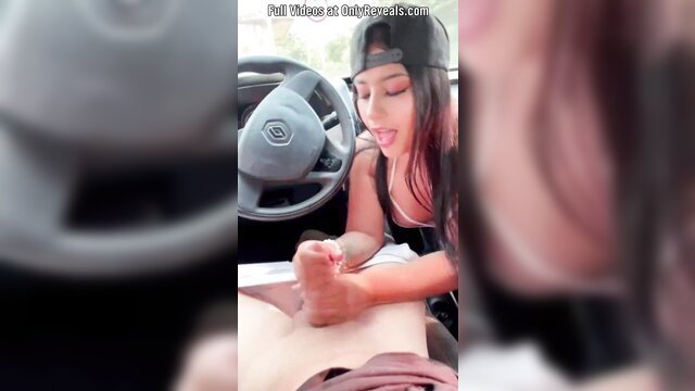 Hot Latina in car gives POV footjob handjob on dick, big tits amateur