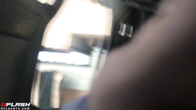 Blurry POV of two Desi North Indian women in car mirror reflection