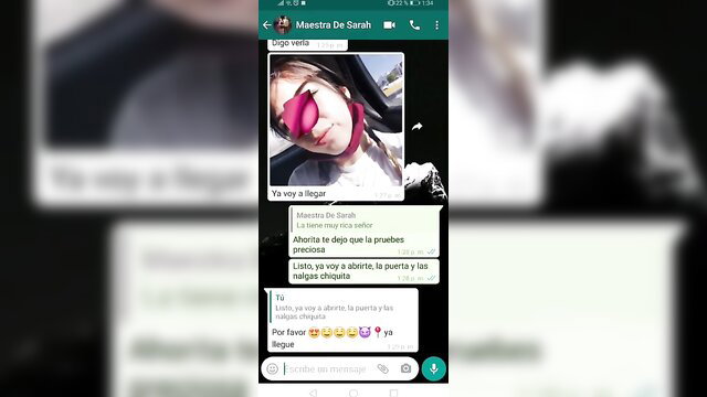 Hot Latina teacher selfie in car, winking with pink lips, amateur facial tease