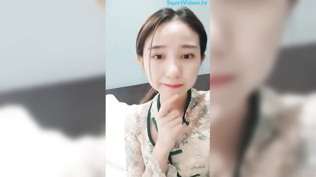 Super beautiful Asian stewardess in sexy qipao, sweet smile closeup