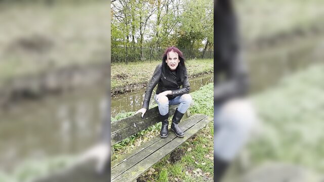 Tgurl Headmistress in leather jacket and boots by canal, Locktober Q&A