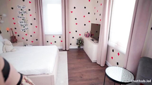 Newchloe18 in pink bedroom, white bed, casual pose cam show