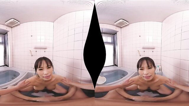 Attractive Asian cougar nude in VR bathtub, legs spread wide